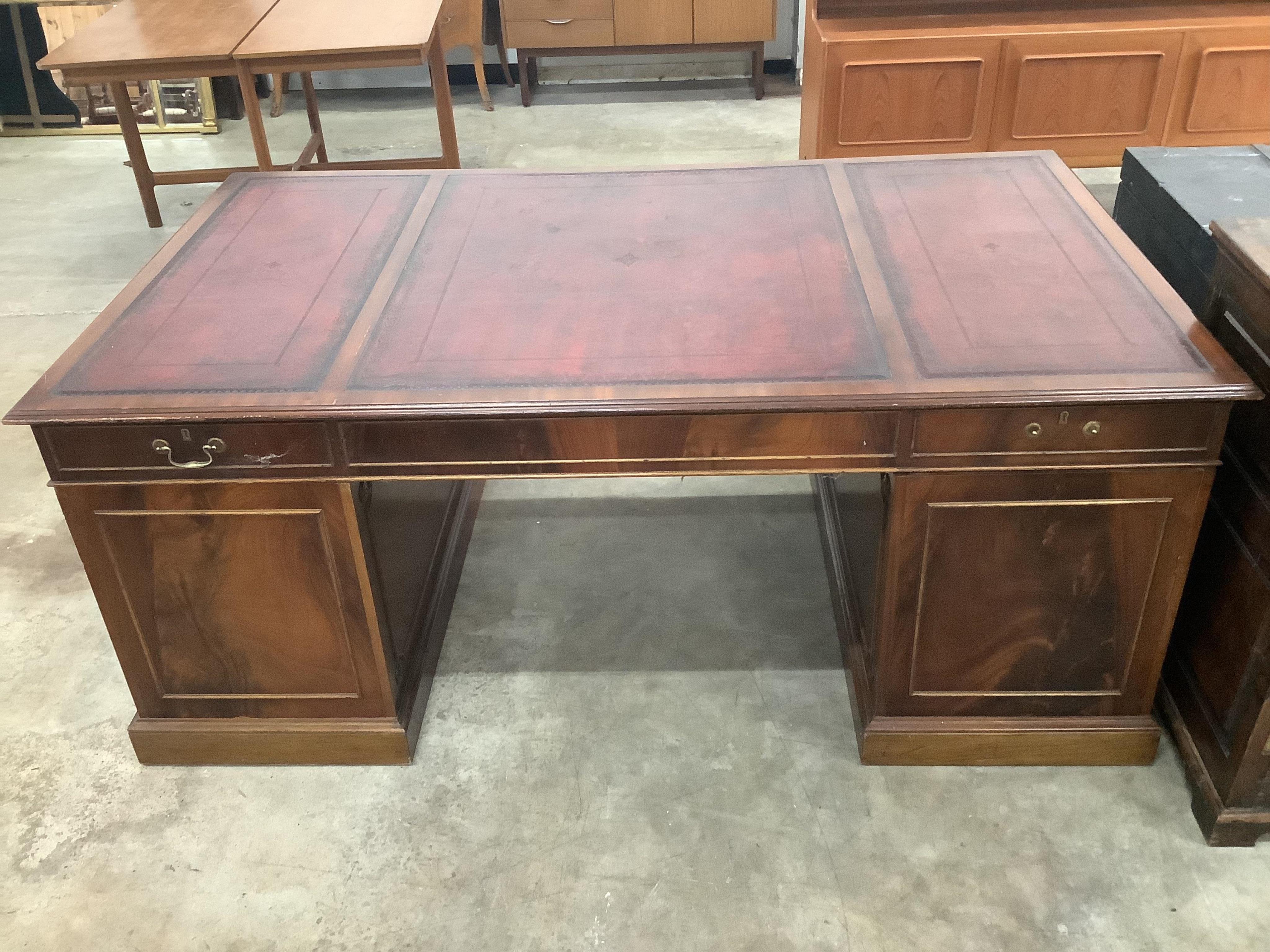A George III style mahogany pedestal desk, width 186cm, depth 106cm, height 76cm. Condition - good